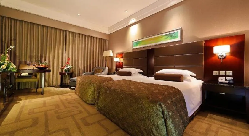 Bed in Kinho Narada Hotel