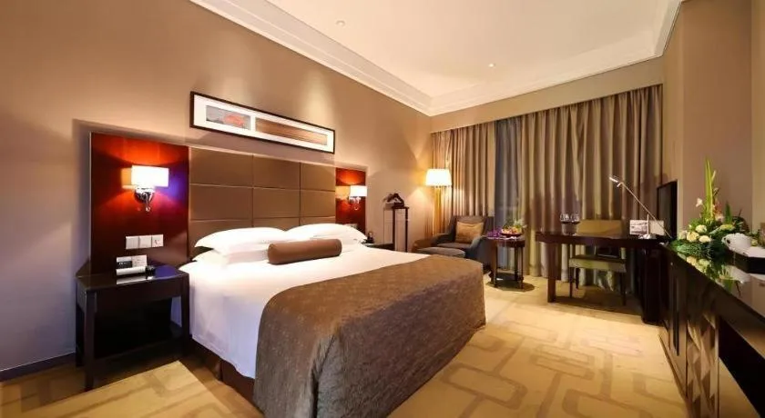 Bed in Kinho Narada Hotel