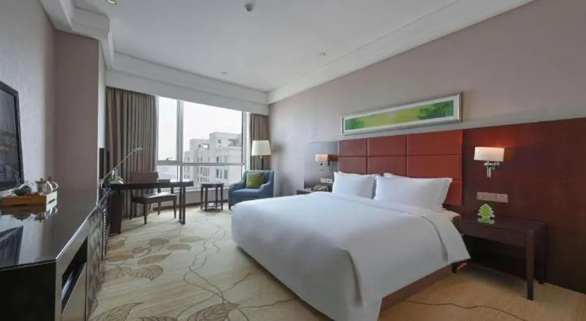 Bed in Kinho Narada Hotel