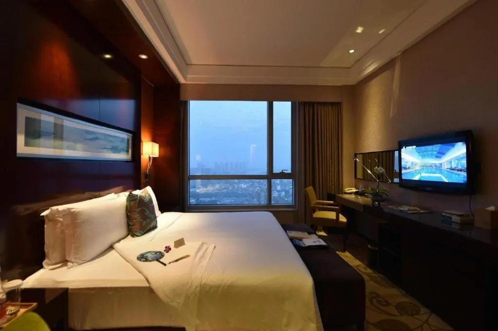 Bed in Kinho Narada Hotel