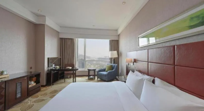 Bed in Kinho Narada Hotel