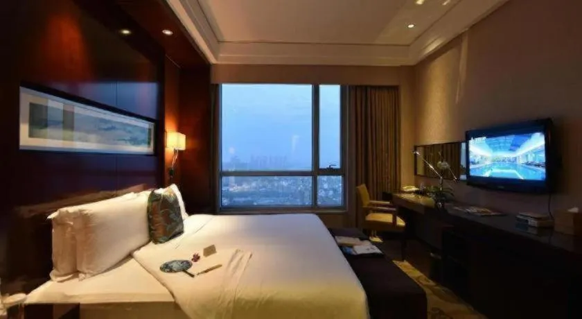 Bed in Kinho Narada Hotel