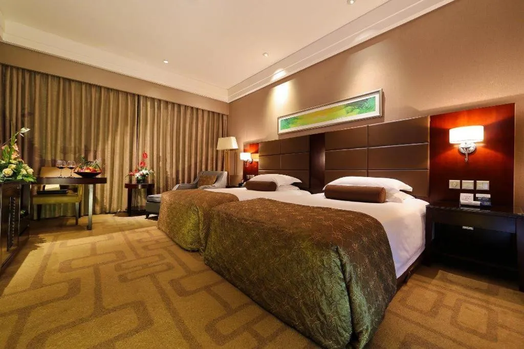 Bed in Kinho Narada Hotel