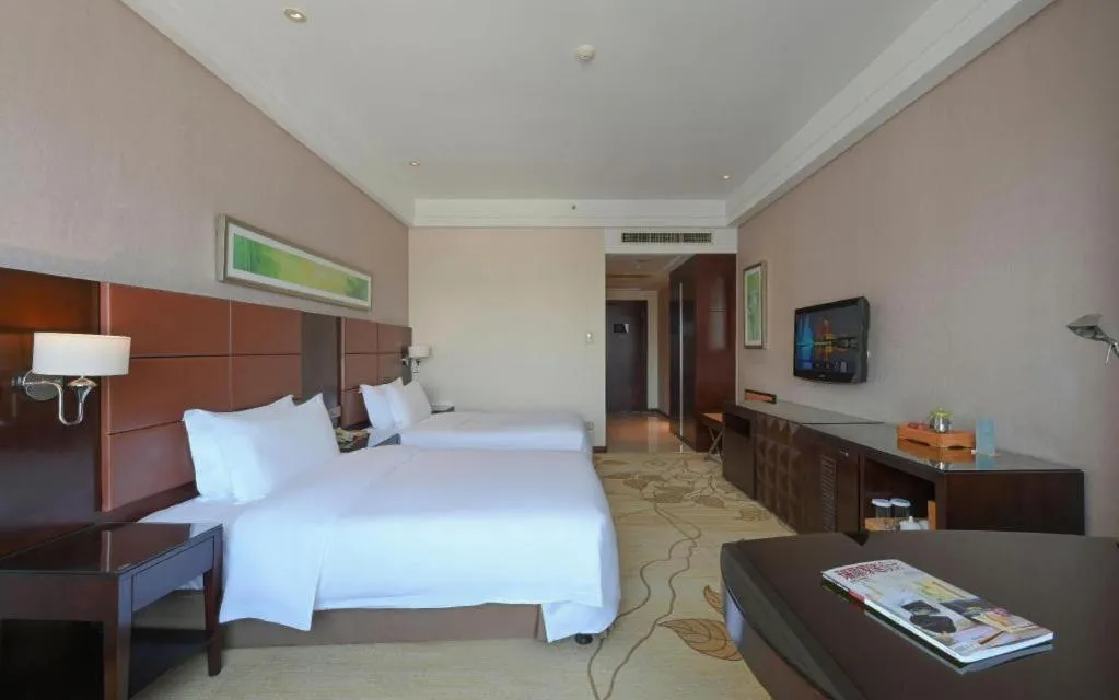 Bed in Kinho Narada Hotel