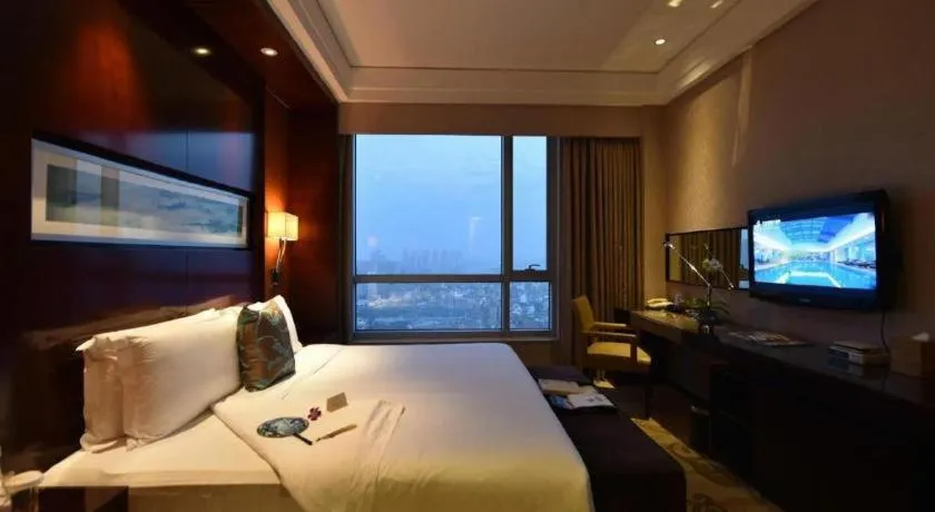 Bed in Kinho Narada Hotel