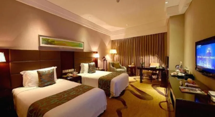 Bed in Kinho Narada Hotel