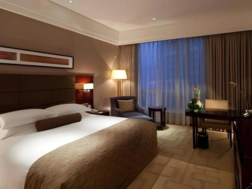 Bed in Kinho Narada Hotel