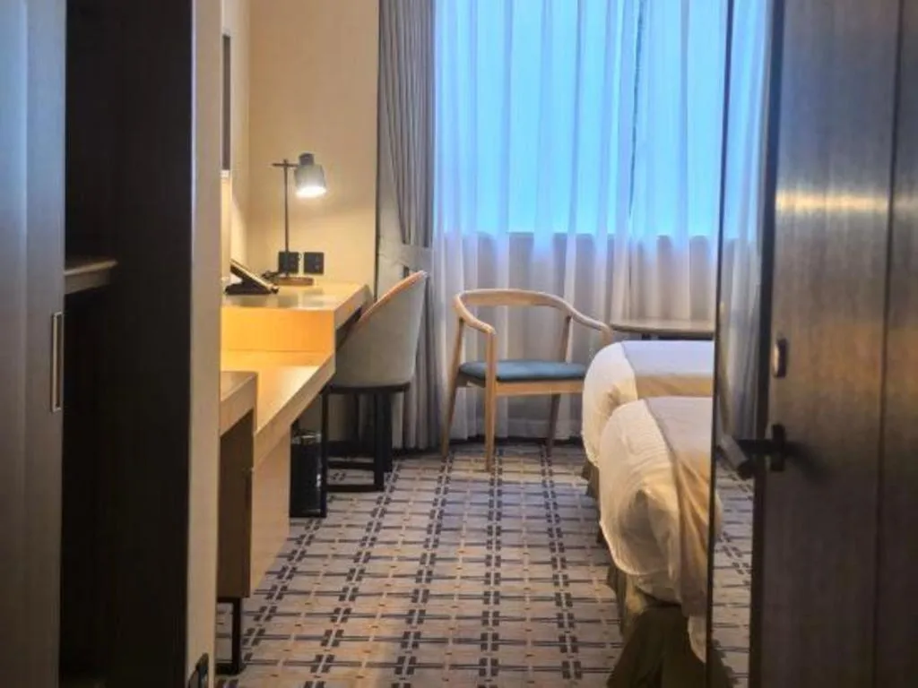 Bed in Jinglun Hotel