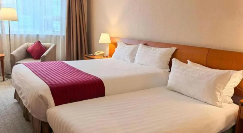 Bed in Jinglun Hotel