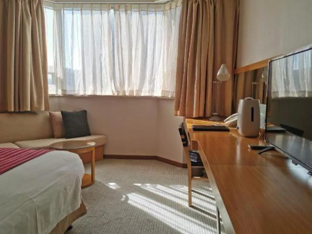 Bed in Jinglun Hotel