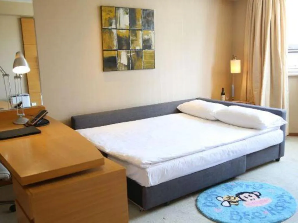 Bed in Jinglun Hotel