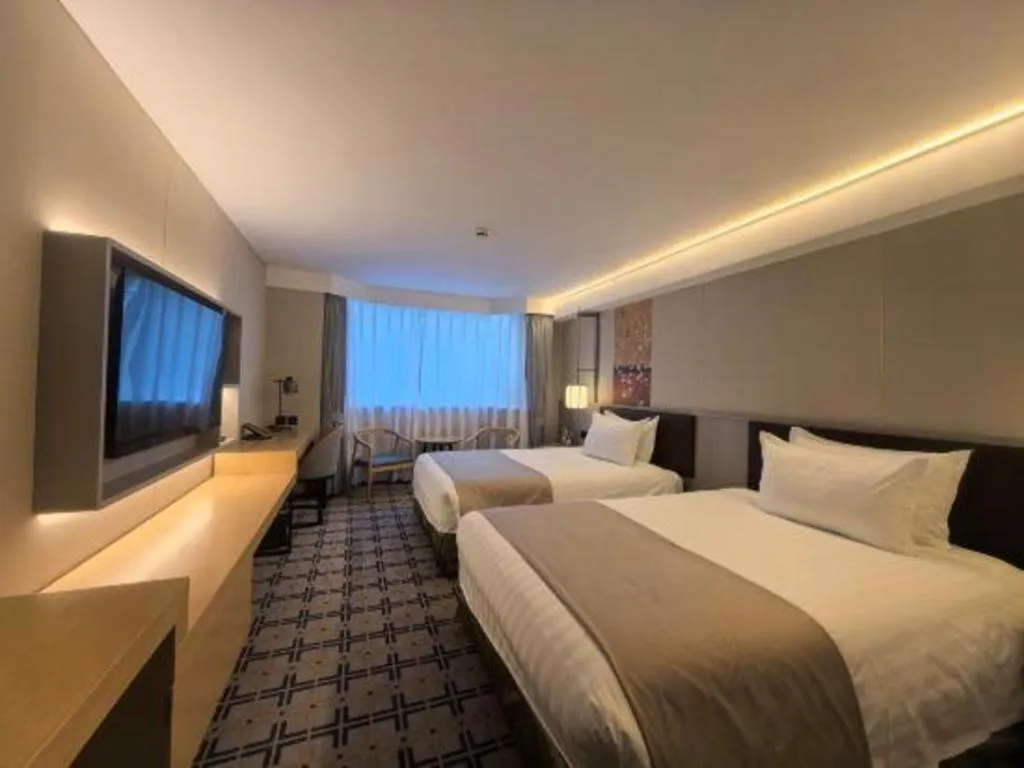 Bed in Jinglun Hotel