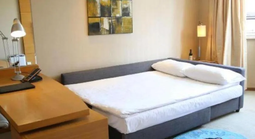 Bed in Jinglun Hotel