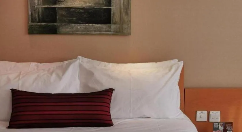 Bed in Jinglun Hotel