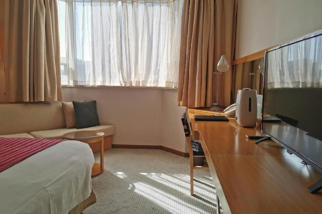 Bed in Jinglun Hotel