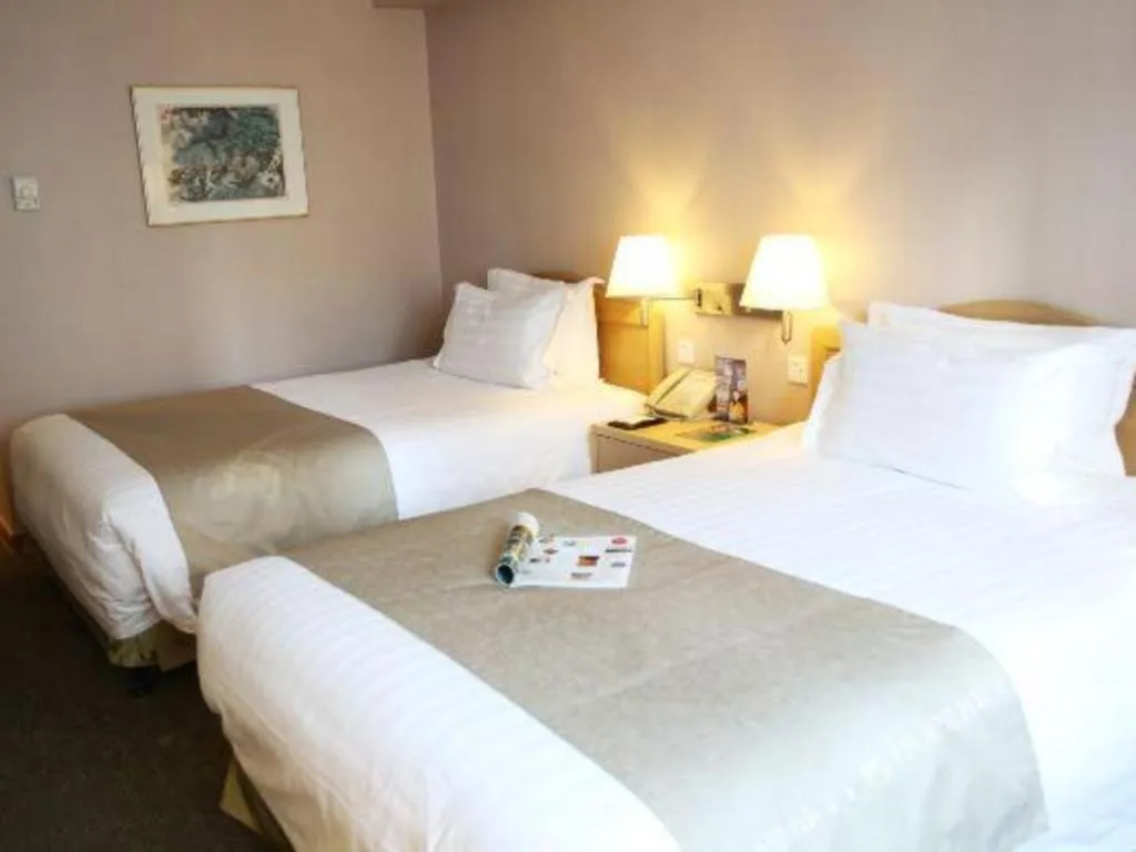 Bed in Jinglun Hotel