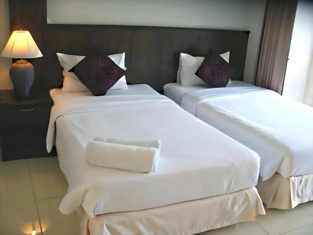 Bed in Kamala Phuyai Resort