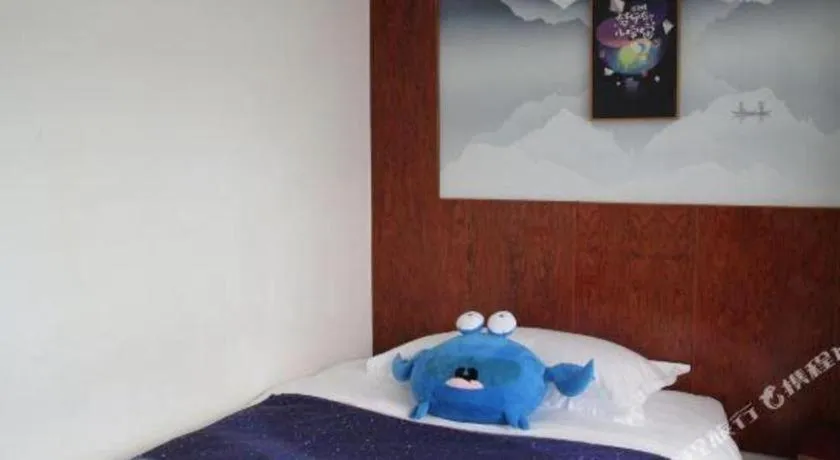 Bed in Expo Garden Hotel