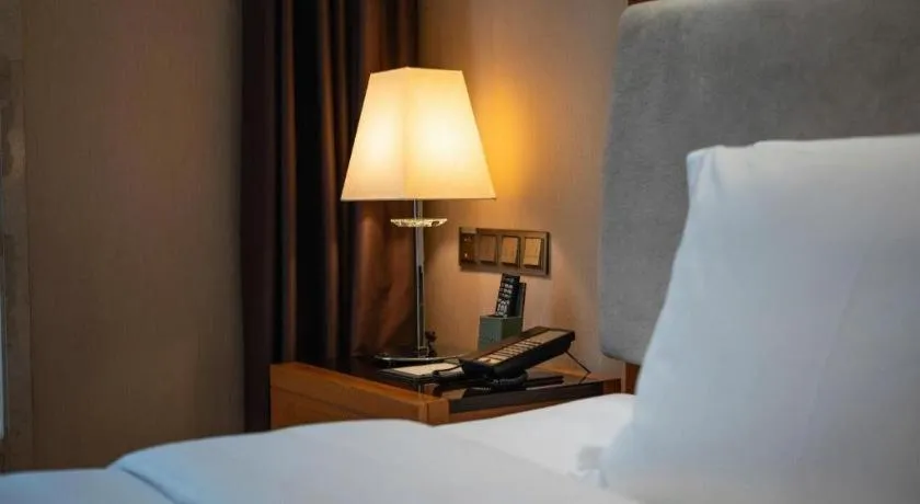 Bed in Expo Garden Hotel