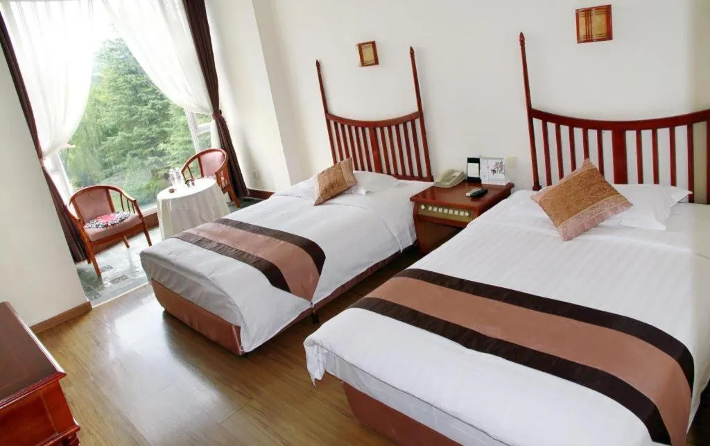 Bed in Expo Garden Hotel