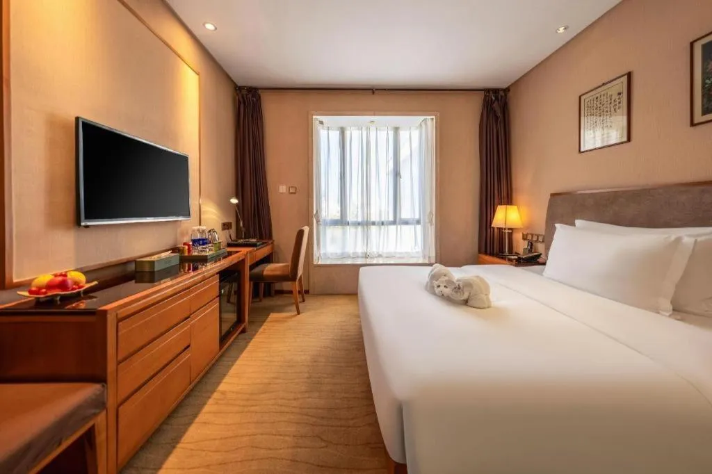 Bed in Expo Garden Hotel