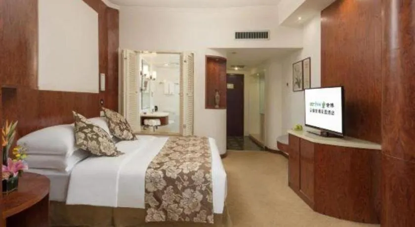 Bed in Expo Garden Hotel