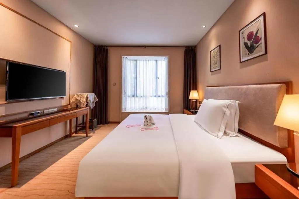 Bed in Expo Garden Hotel