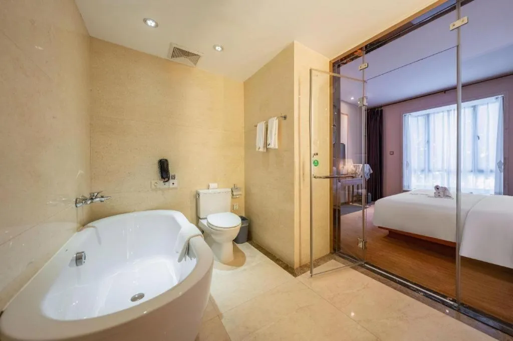 Bed in Expo Garden Hotel