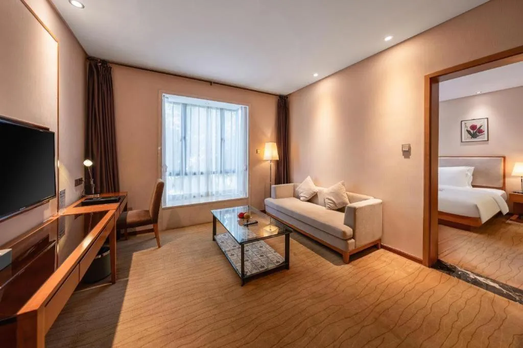 Bed in Expo Garden Hotel