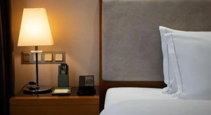 Bed in Expo Garden Hotel