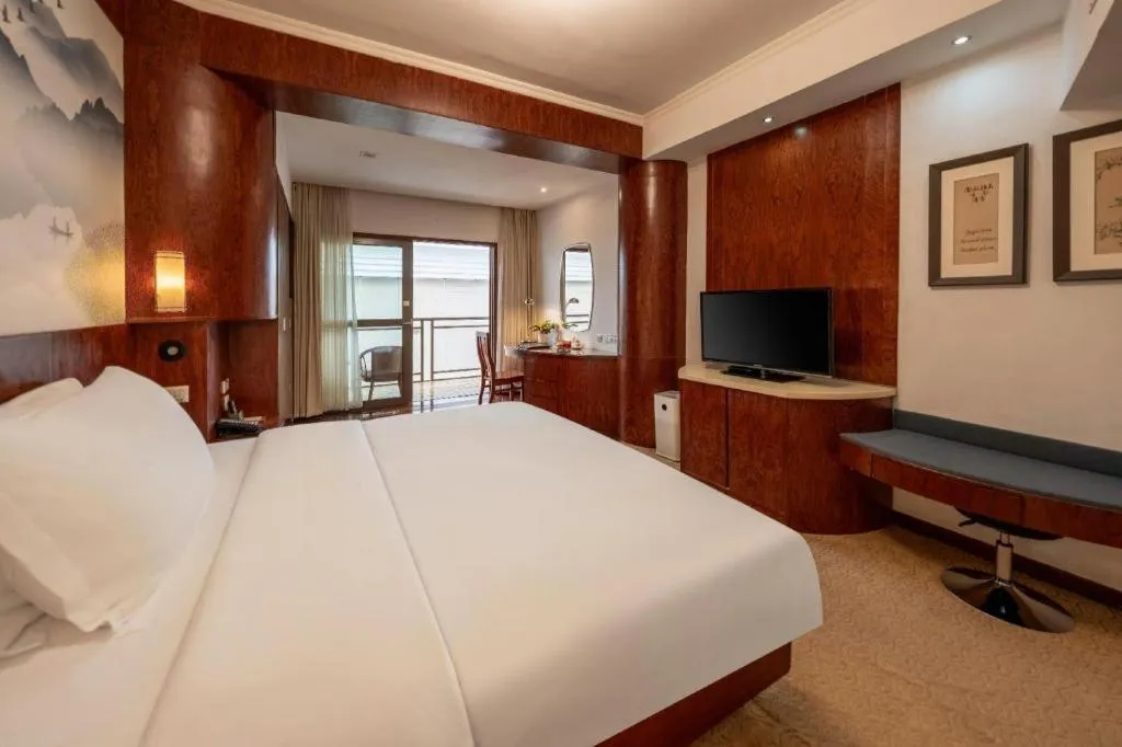 Bed in Expo Garden Hotel