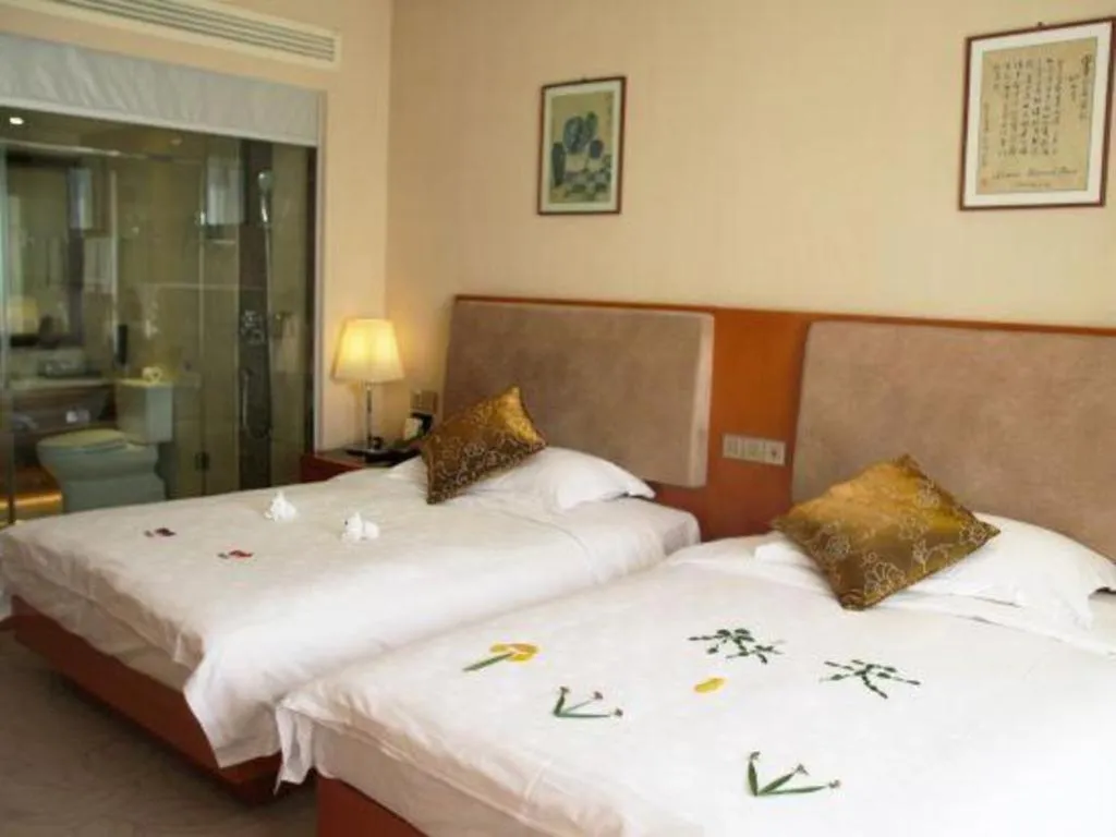 Bed in Expo Garden Hotel