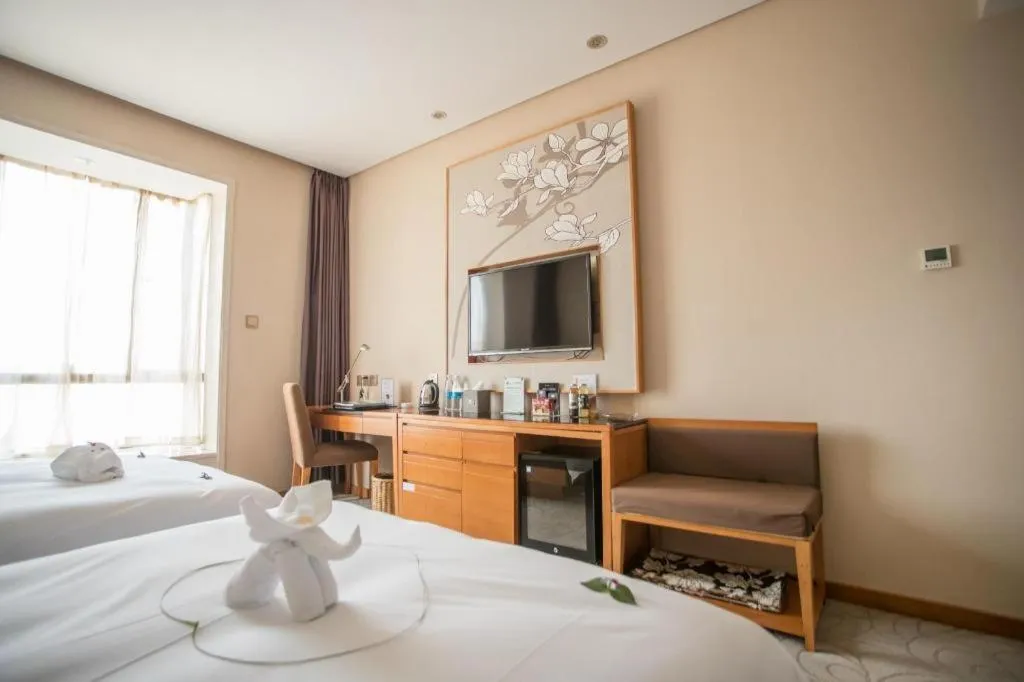 Bed in Expo Garden Hotel