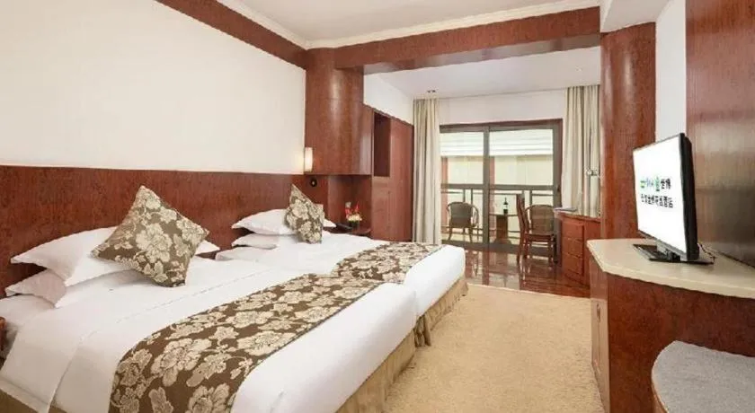 Bed in Expo Garden Hotel