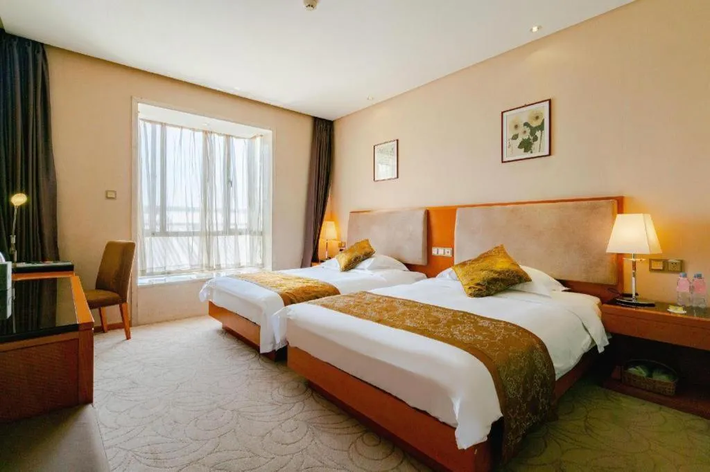 Bed in Expo Garden Hotel