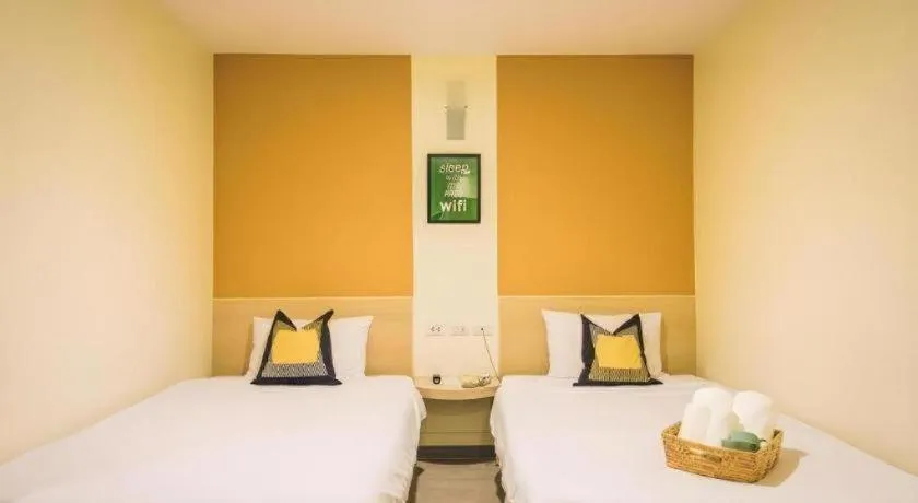 Bed in New Suanmali Hotel