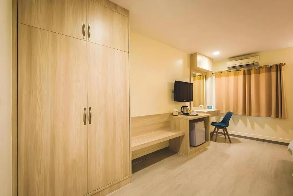 Bed in New Suanmali Hotel