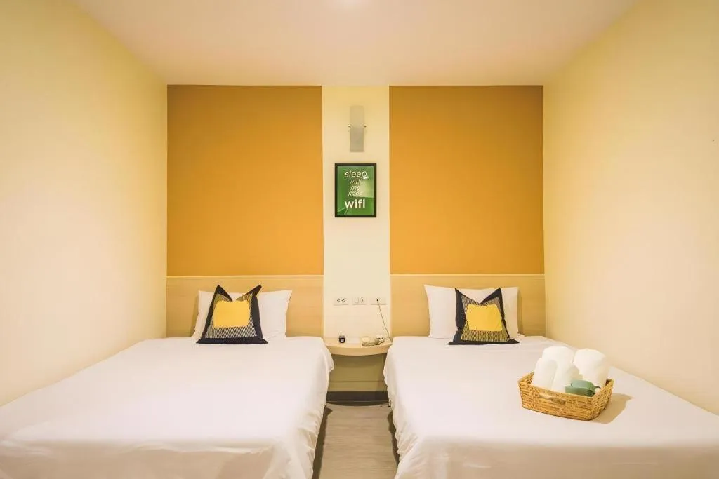 Bed in New Suanmali Hotel