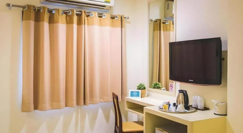 Bed in New Suanmali Hotel