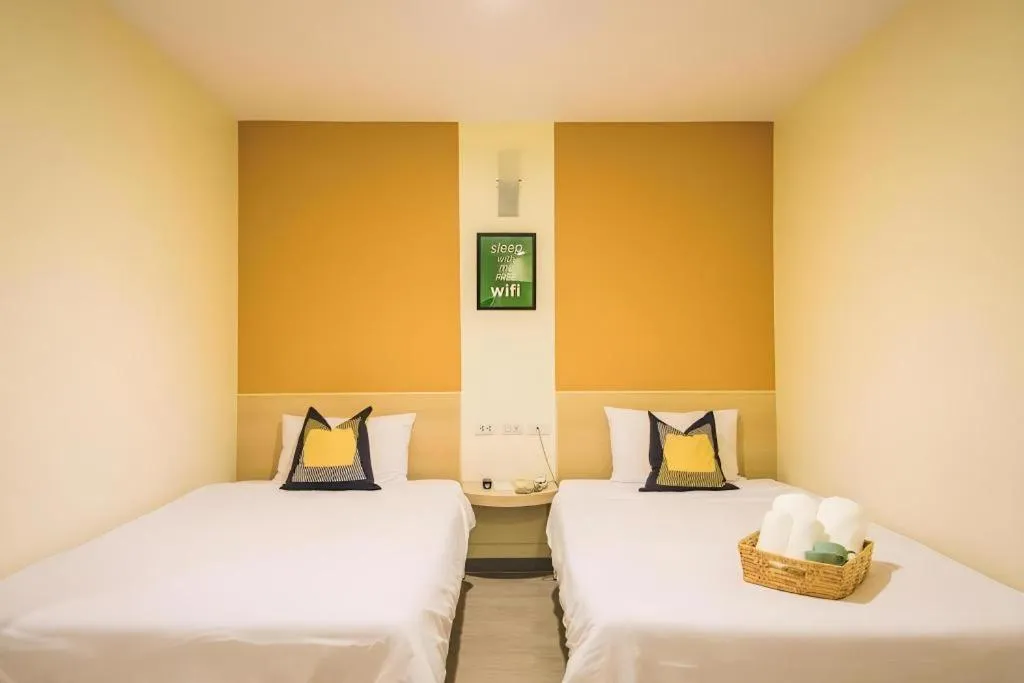 Bed in New Suanmali Hotel