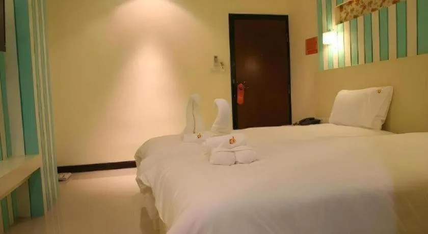 Bed in Ido Boutique Suite