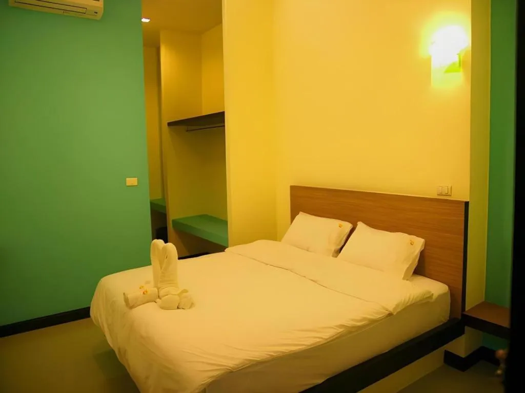 Bed in Ido Boutique Suite