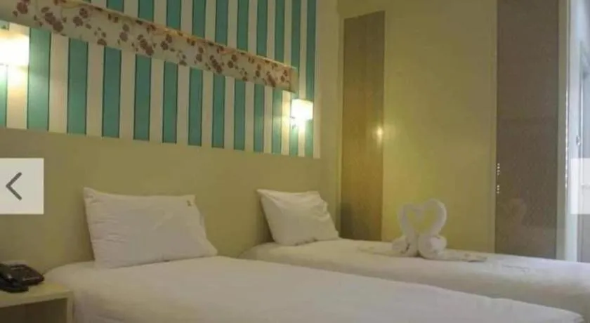 Bed in Ido Boutique Suite