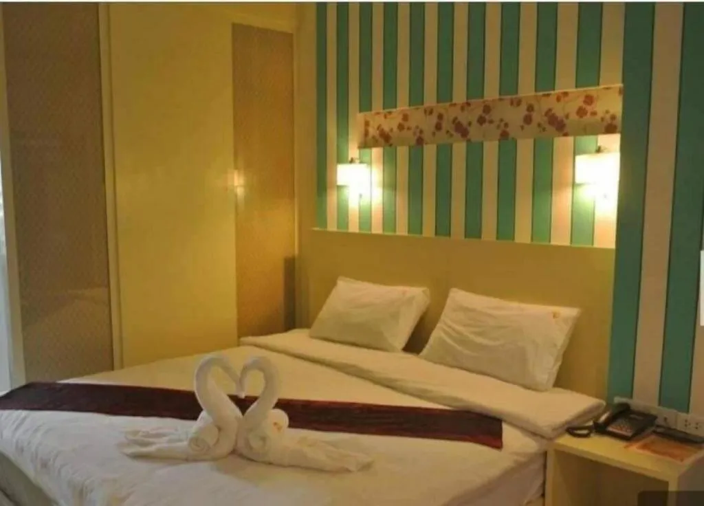 Bed in Ido Boutique Suite