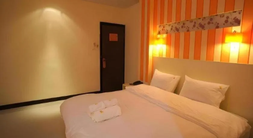 Bed in Ido Boutique Suite