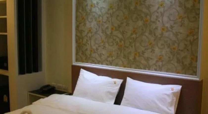 Bed in Ido Boutique Suite