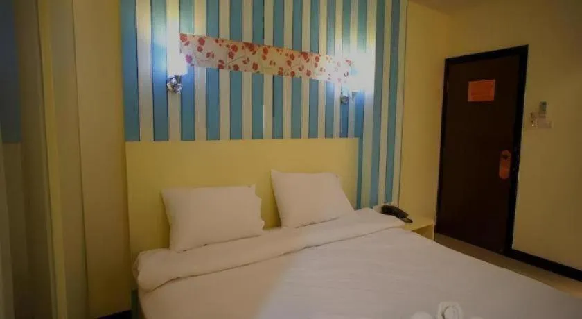 Bed in Ido Boutique Suite