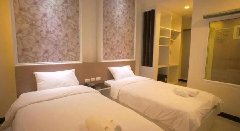 Bed in Ido Boutique Suite