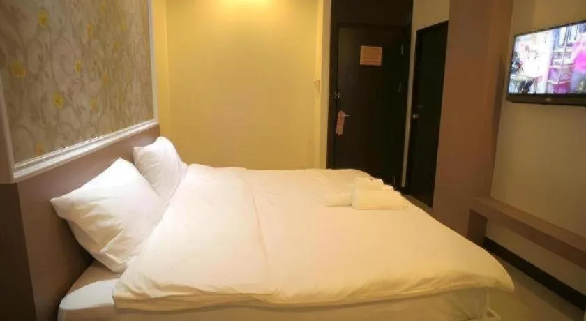 Bed in Ido Boutique Suite