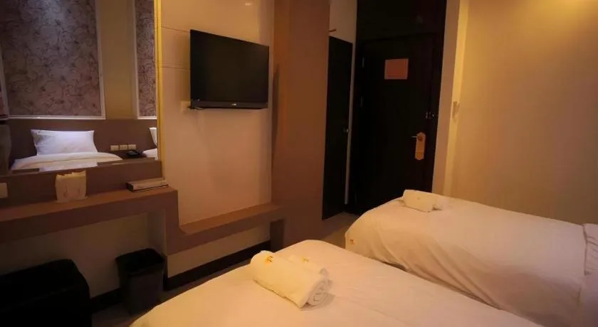 Bed in Ido Boutique Suite